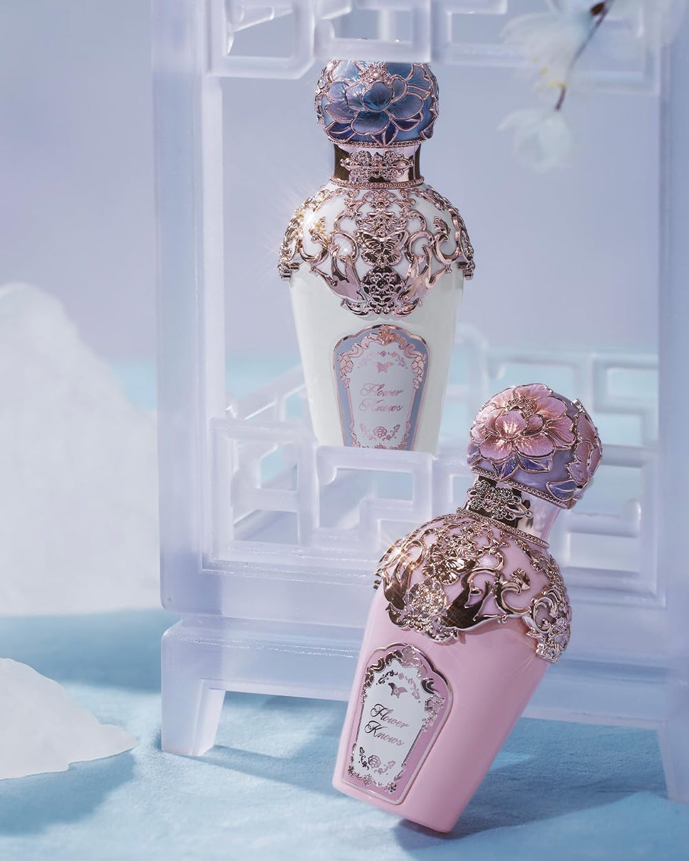 Kingfisher feather-inspired label on Flower Knows perfume enhances collector's display.
