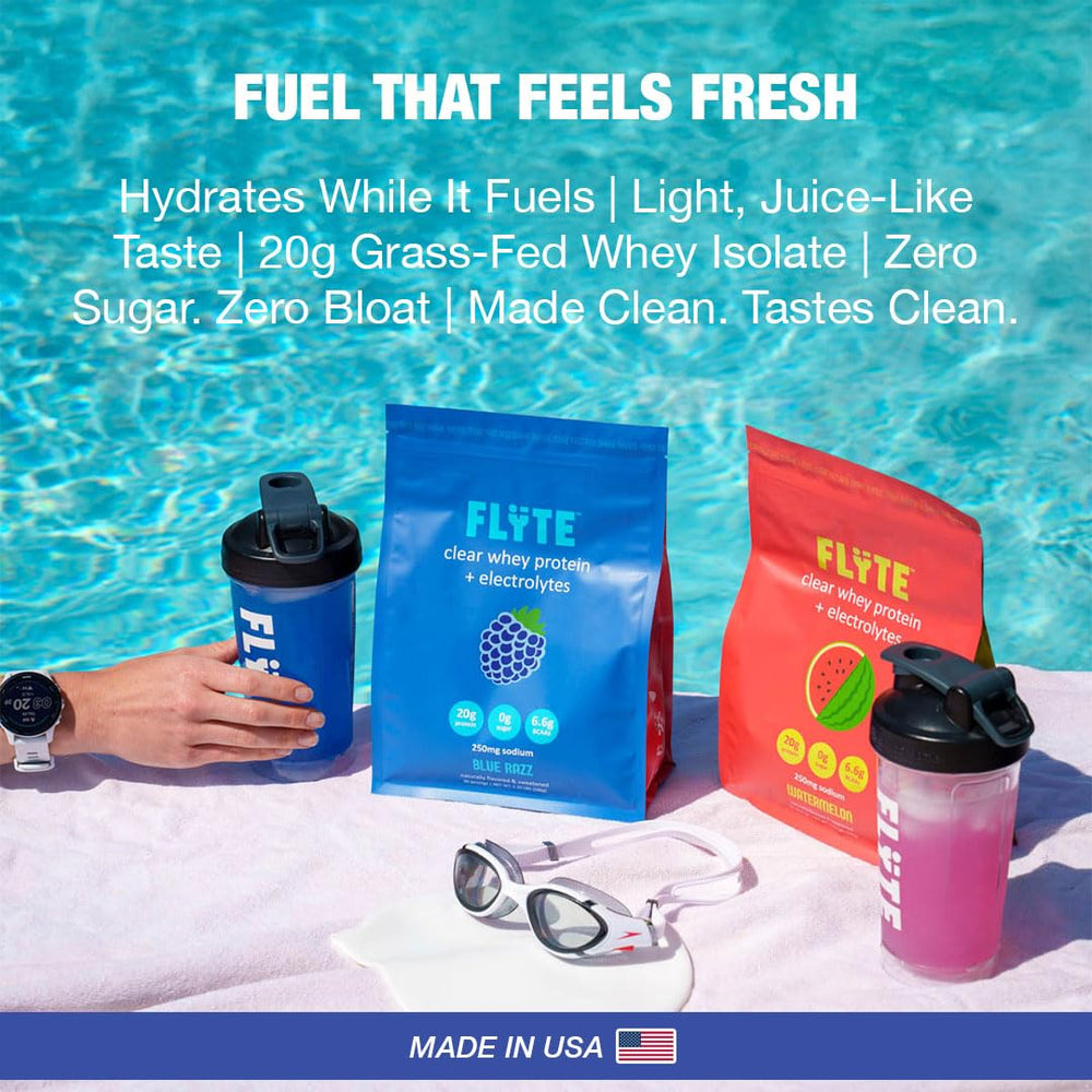FLYTE Clear Whey Isolate Blue Raspberry packaging on shelf signals gluten-free and no added sugar