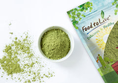 Food to Live Alfalfa Powder in a green smoothie glass