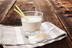 Food to Live Black Maca Powder in a smoothie bowl, flavorful energy-boosting addition.