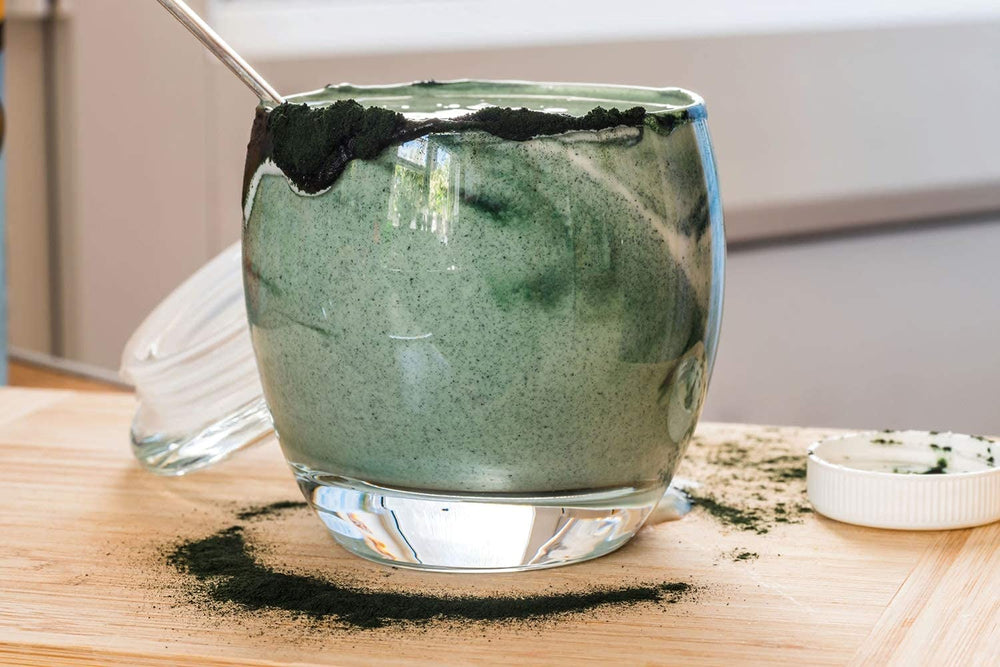 Food to Live chlorella powder sprinkled on salad for added greens.