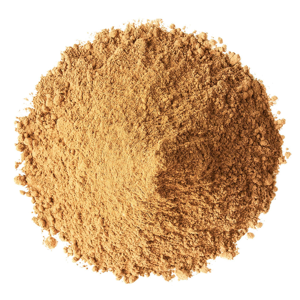 Food to Live cordyceps powder being poured for beverages and recipes