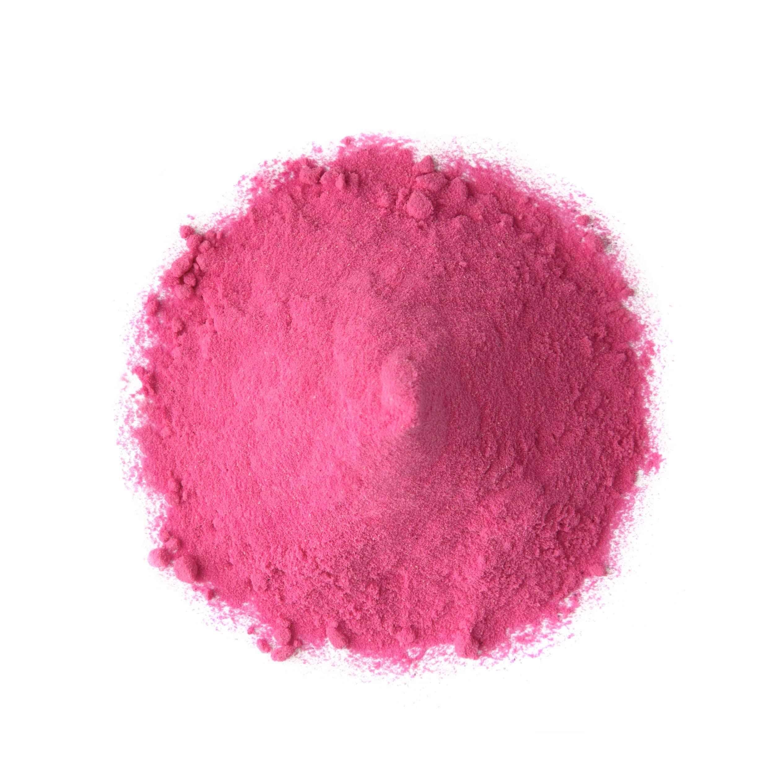 Food to Live dragon fruit powder being poured into a glass