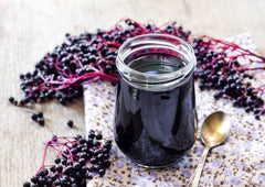 Food to Live elderberry powder swirled into yogurt