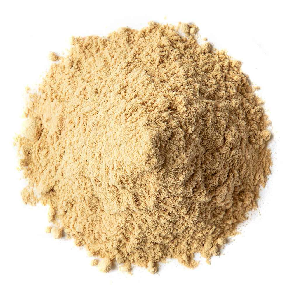 Food to Live Triphala powder tea mix in cup highlights earthy tart flavor and soothing aroma