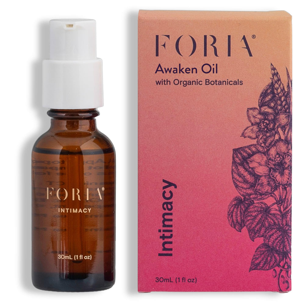 Foria Awaken Oil bottle close-up highlighting a natural formula for enhanced sensation.
