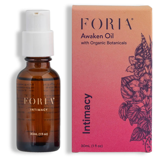 Foria Awaken Oil bottle close-up highlighting a natural formula for enhanced sensation.