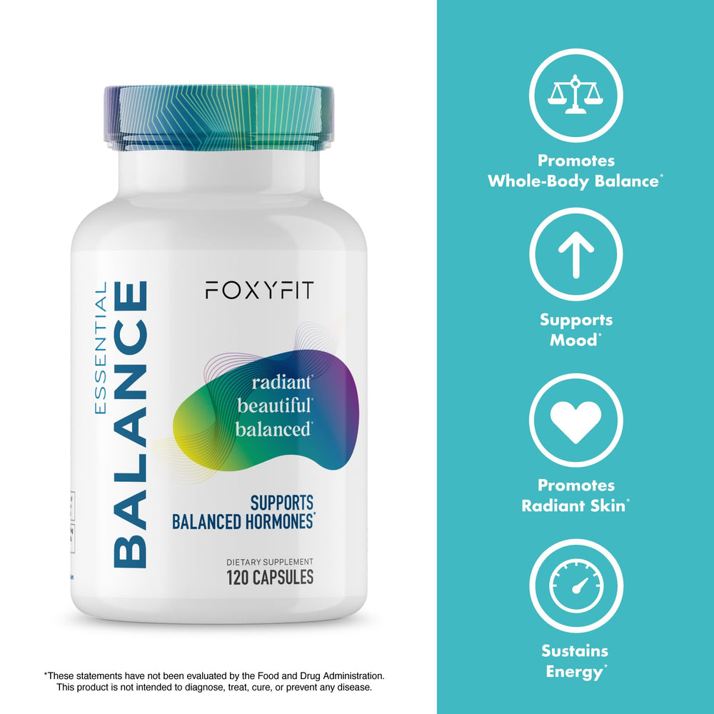 A hand holding FoxyFit Essential Balance bottle during morning routine for daily wellness.
