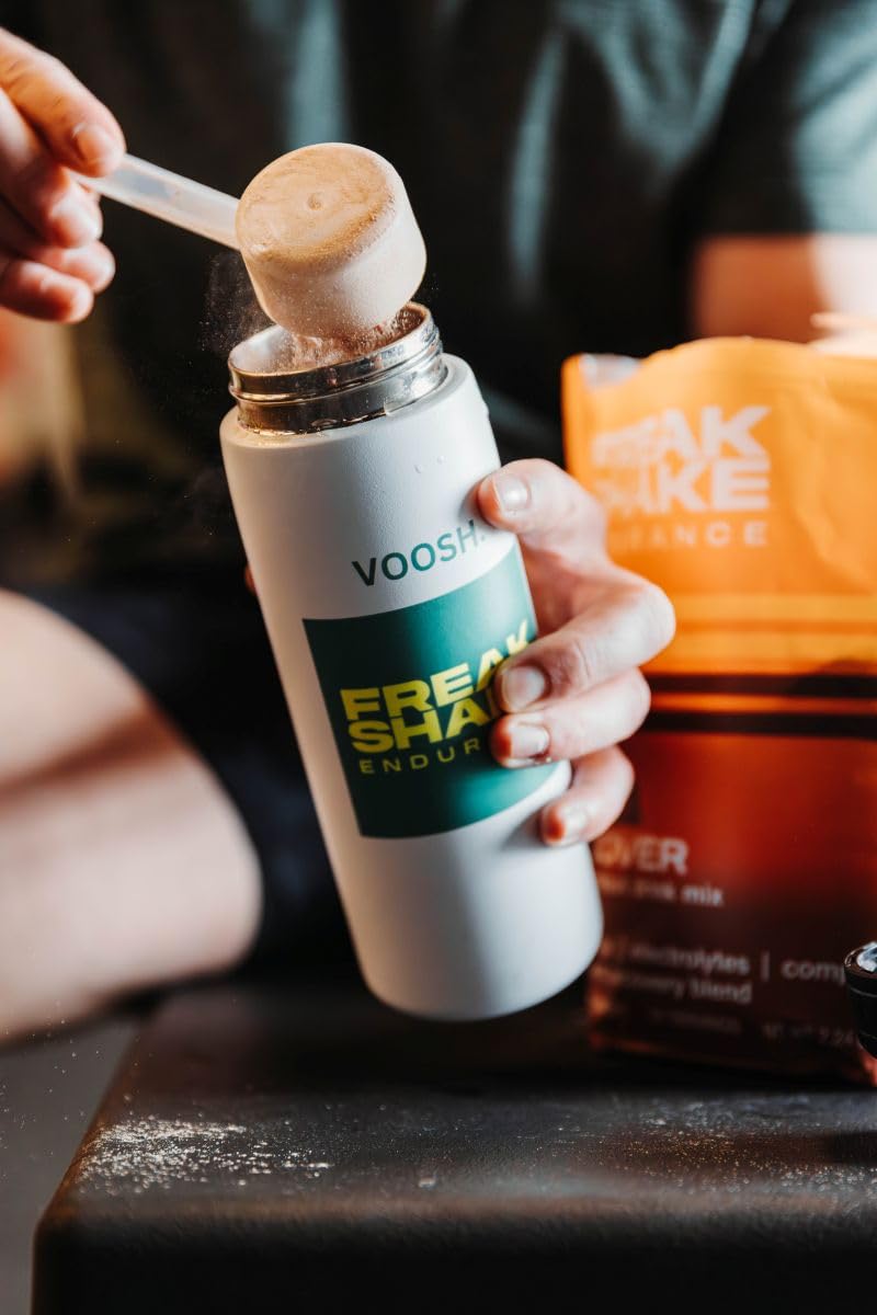 Freak Shake Recover chocolate water-stir illustrates quick hydration after intense sessions.