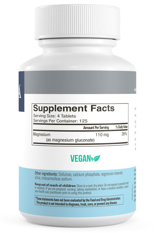 Freeda Magnesium Gluconate tablets close-up highlighting smooth, easy-to-digest form.