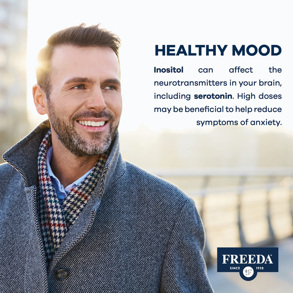 Freeda Myo-Inositol powder dissolving into a glass of water.
