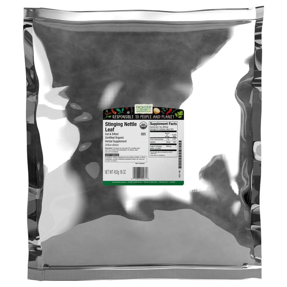 Frontier Co-op organic nettle leaf being brewed for tea in a mug