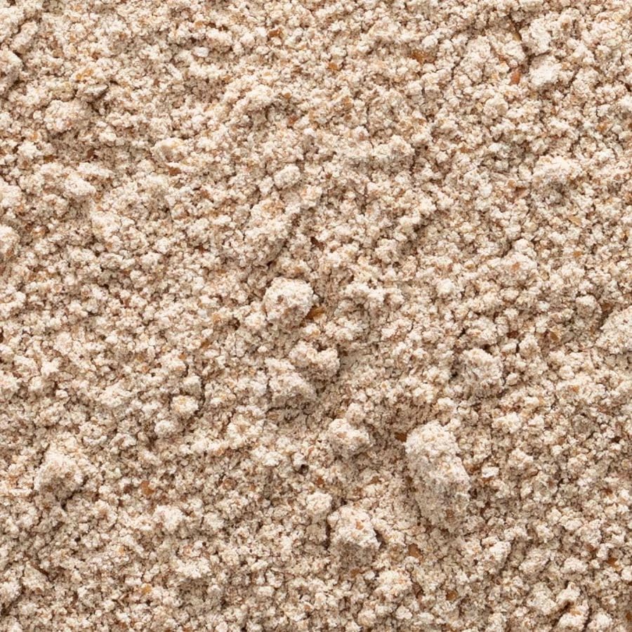 Measuring Frontier Co-op Psyllium Seed Powder with a scoop for precise fiber addition