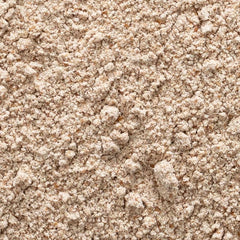 Measuring Frontier Co-op Psyllium Seed Powder with a scoop for precise fiber addition