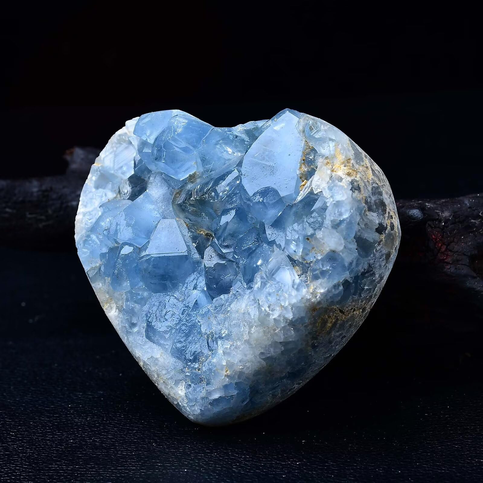 FZBHRO celestite geode with stand creates a tranquil workspace.
