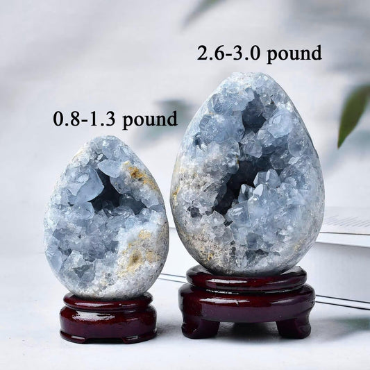 FZBHRO hand-carved celestite egg highlights pale blue charm for display.