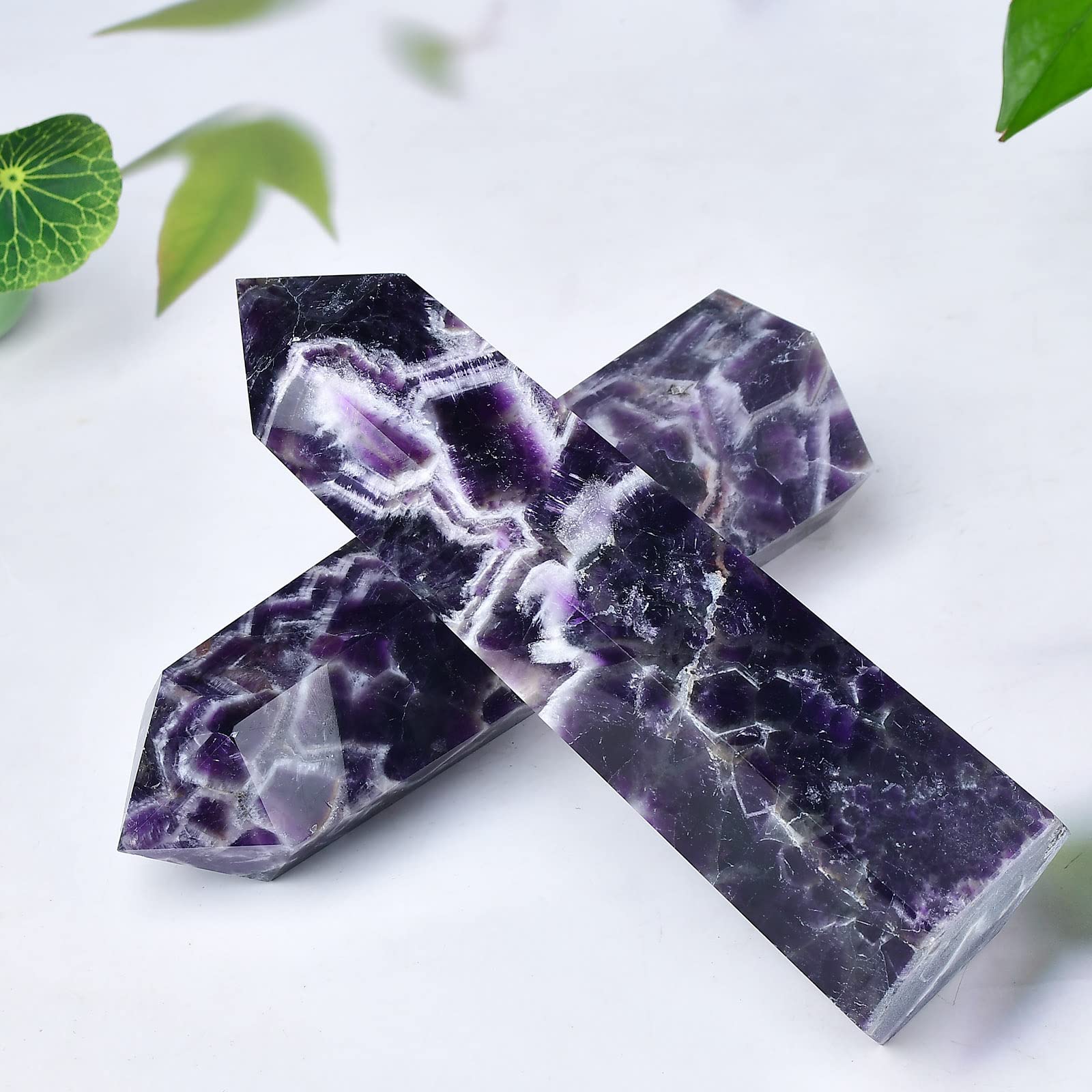 FZBHRO Hand carved crystal wand with unique natural pattern.
