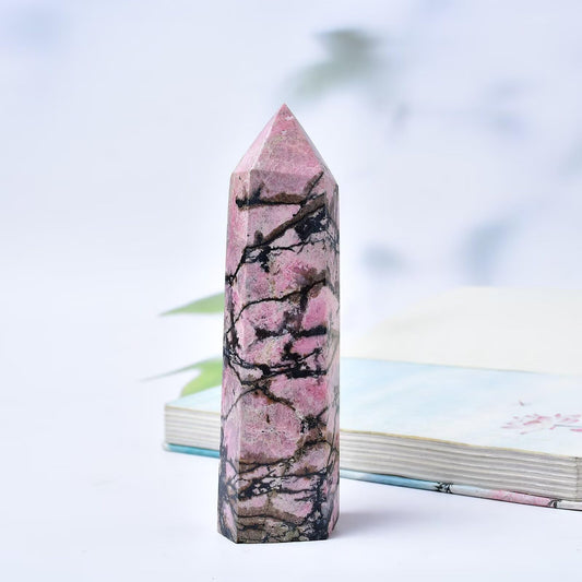 FZBHRO Rhodonite crystal point obelisk directs energy for targeted practice.