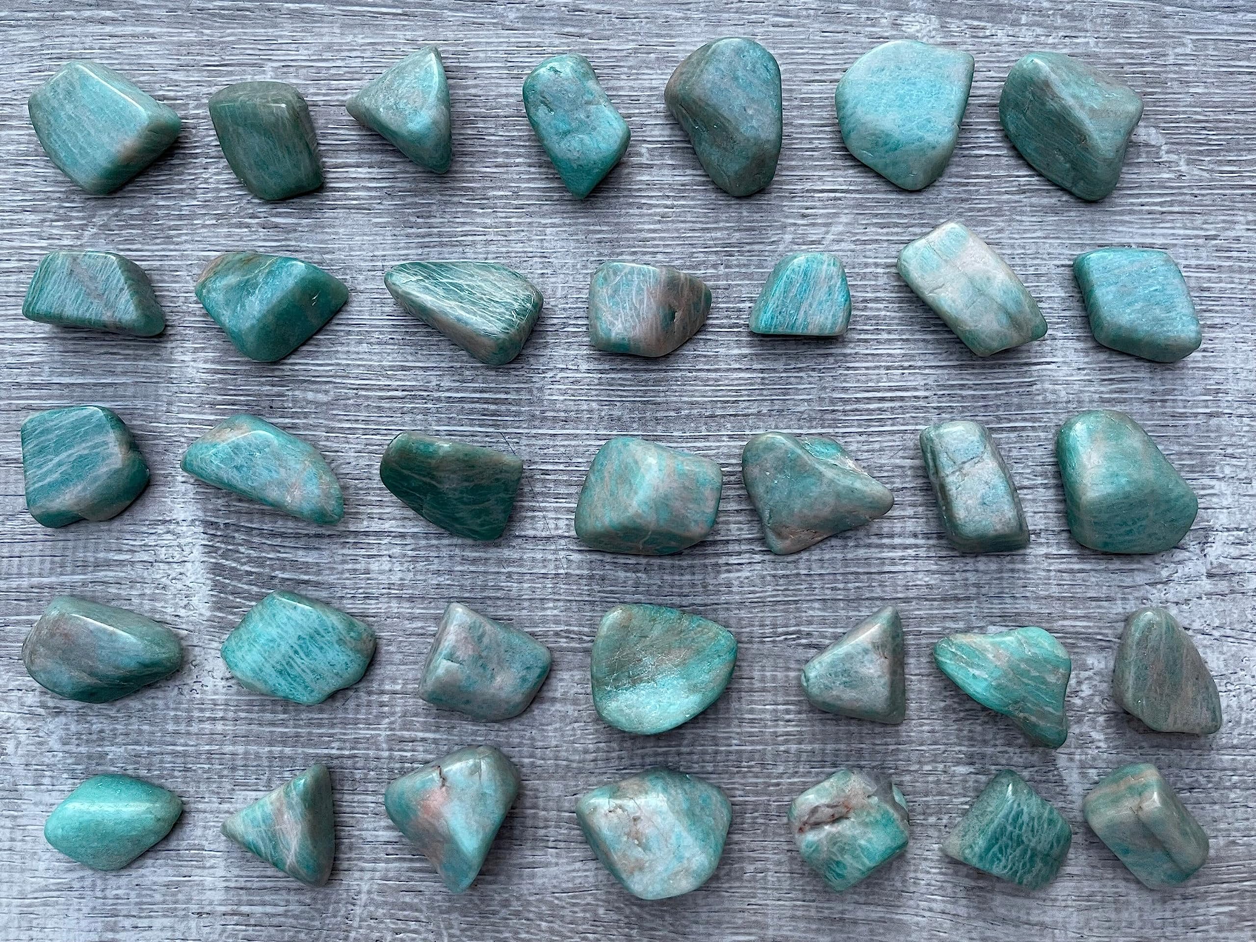 GAF Treasures polished amazonite stones reflecting natural variety and patterns.