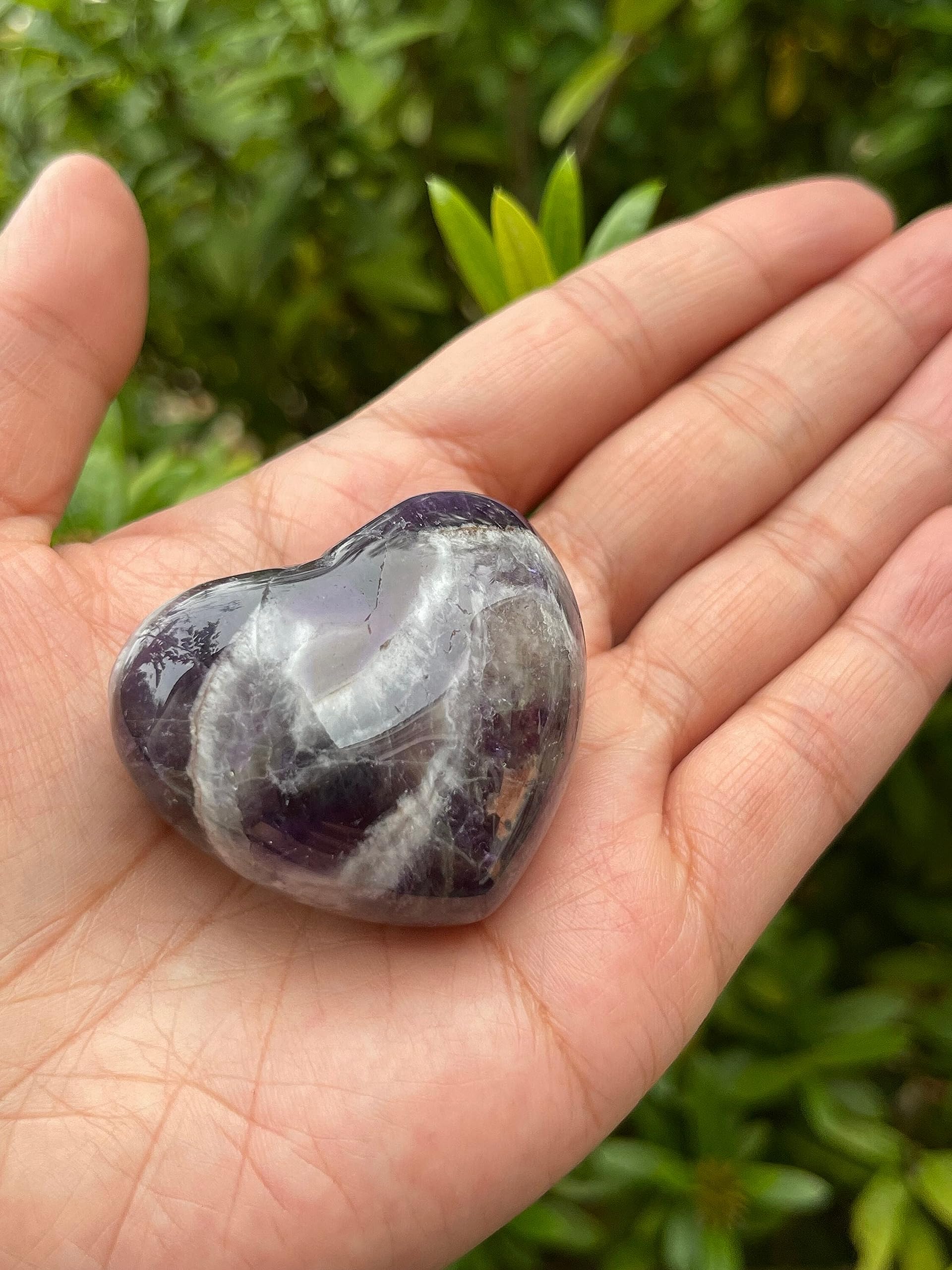 GAF Treasures Chevron Amethyst Palm Stone showcasing grounding energy for the heart chakra.
