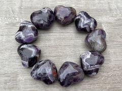 GAF Treasures Chevron Amethyst Worry Stone in hand to ease daily stress.