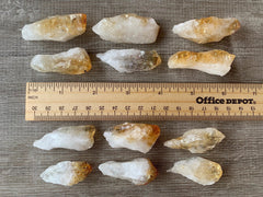 GAF TREASURES Citrine Points grid-work setup for crystal therapy layouts.