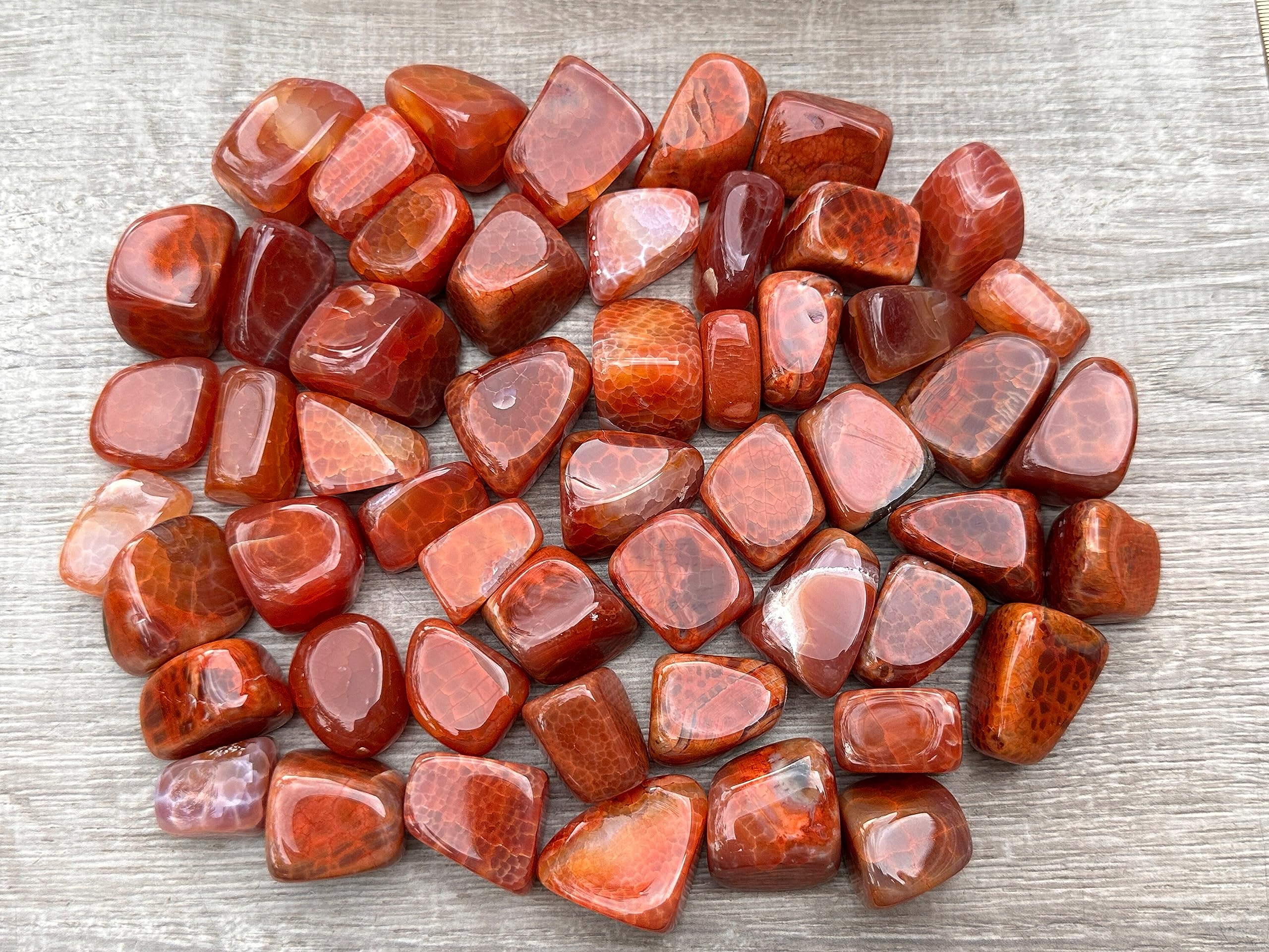 GAF Treasures Fire Agate polished gemstone with varied colors for meditation.