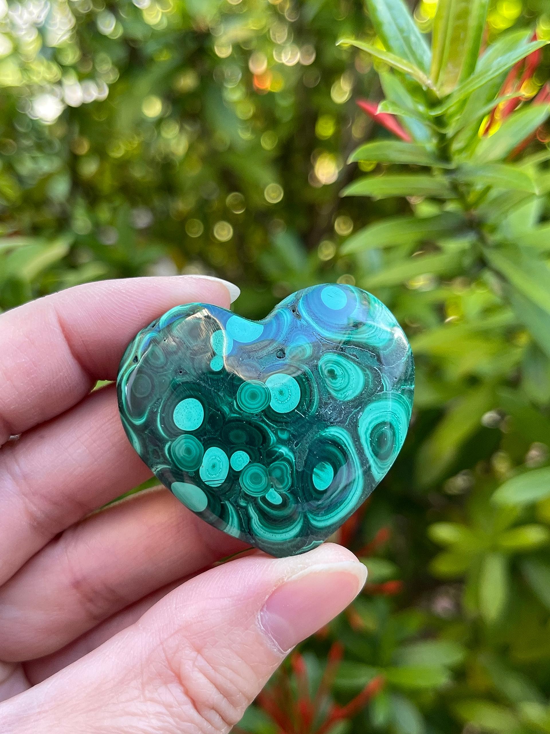 GAF TREASURES malachite palm stone, fits the hand for focused energy.