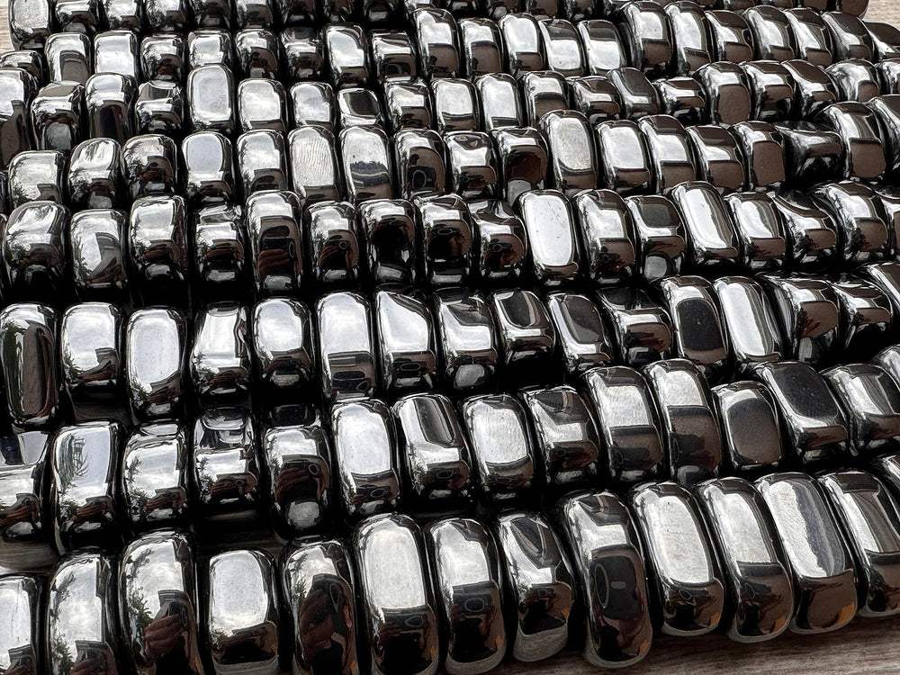 GAF Treasures polished hematite tumbles for pocket carry