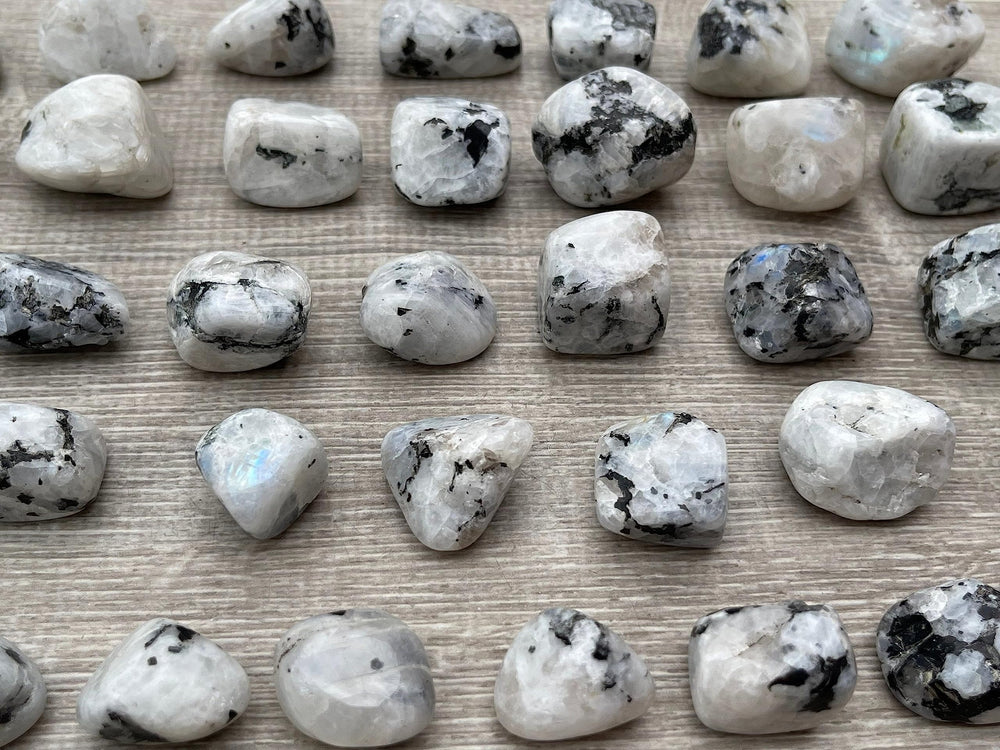 GAF Treasures Rainbow Moonstone tumbled stones with natural color patterns.