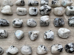 GAF Treasures Rainbow Moonstone tumbled stones with natural color patterns.
