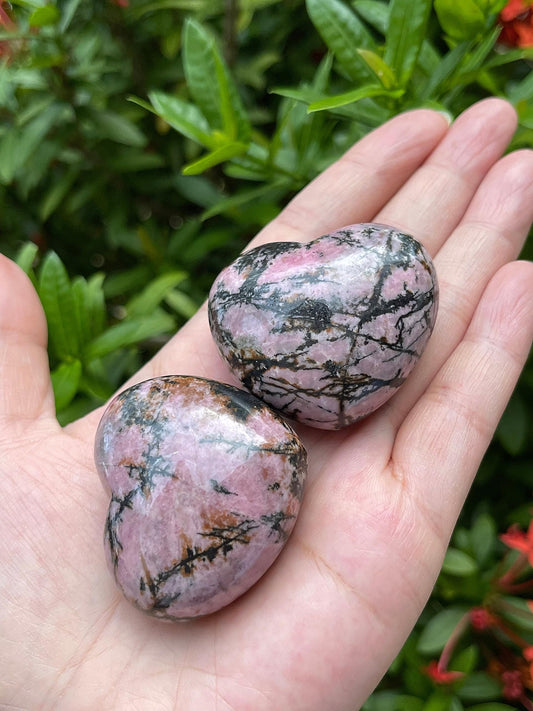 GAF Treasures Rhodonite Heart held in hand for relaxation and focus during meditation