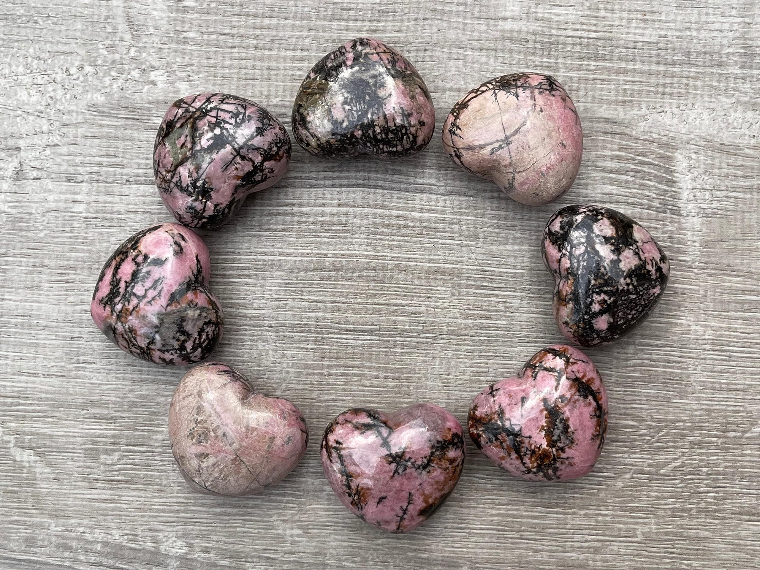 GAF Treasures Rhodonite heart of varying size and color due to natural stone