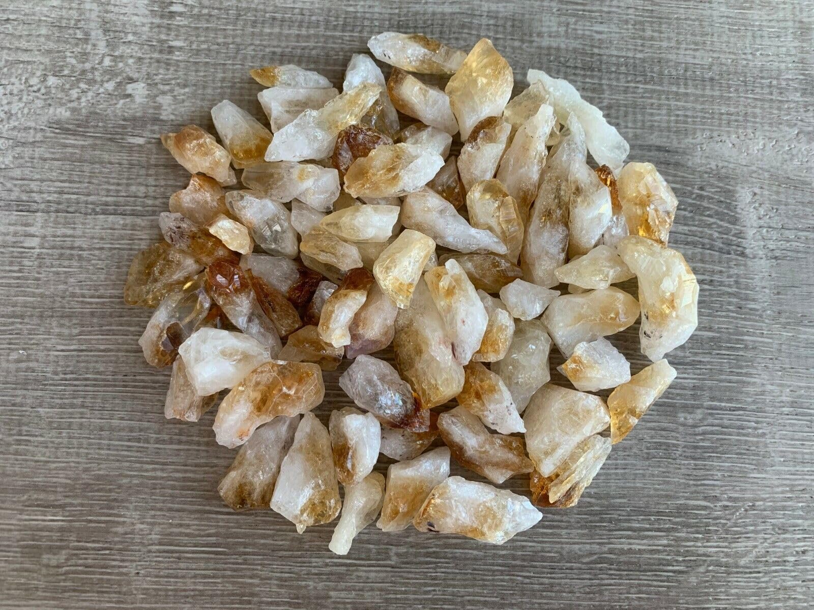 GAF TREASURES rough citrine point natural color variation enhances display and collection.