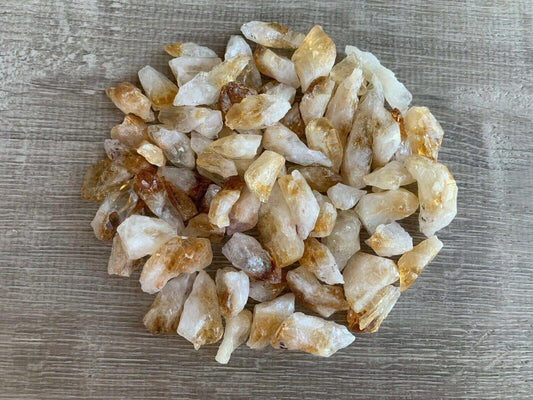 GAF TREASURES rough citrine point natural color variation enhances display and collection.