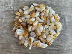 GAF TREASURES rough citrine point natural color variation enhances display and collection.