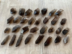GAF TREASURES smoky quartz point grade-a quality for grid work and energy layouts.