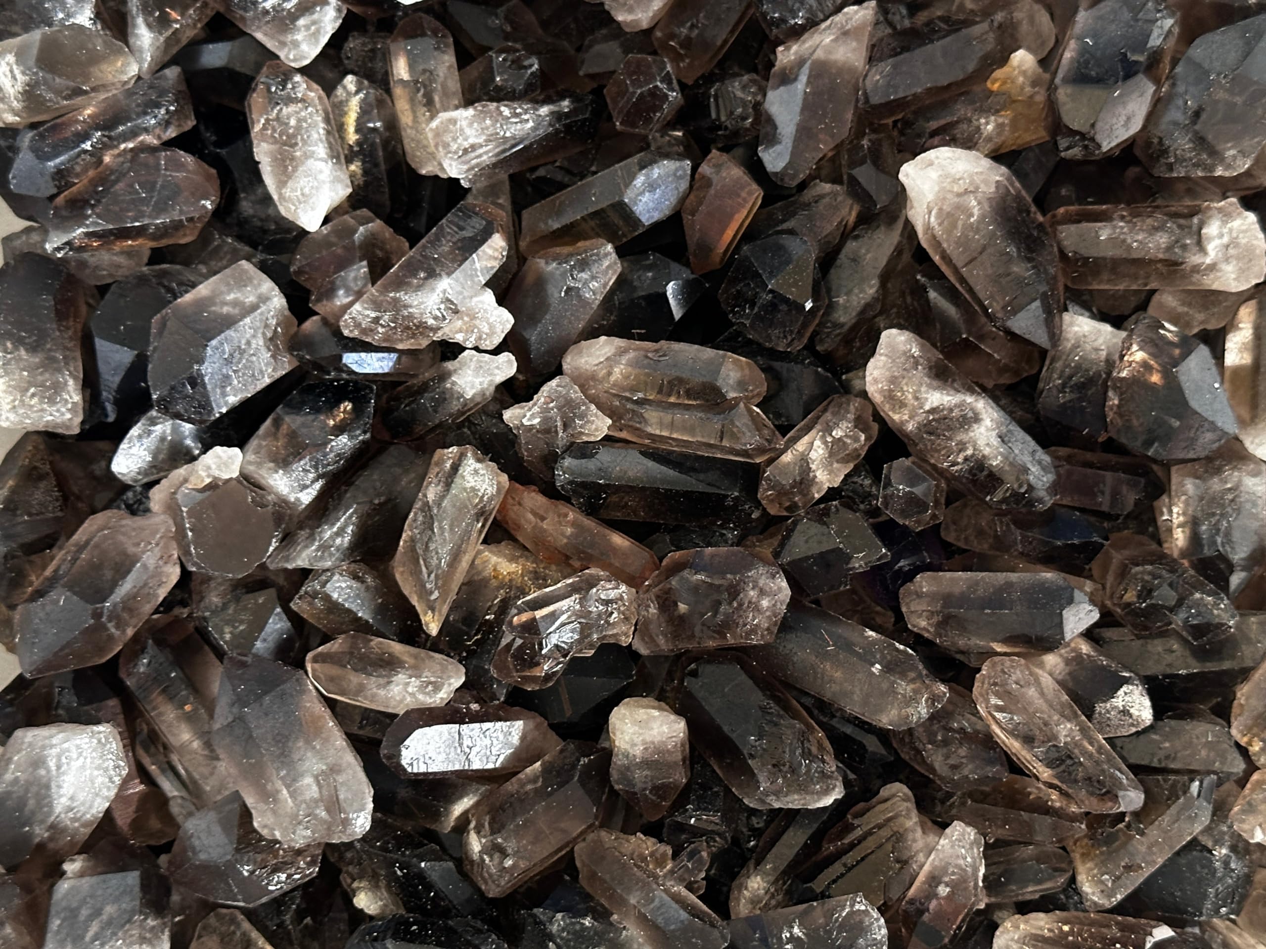 GAF TREASURES Smoky Quartz Point earthy tones complement natural decor and energy-focused spaces