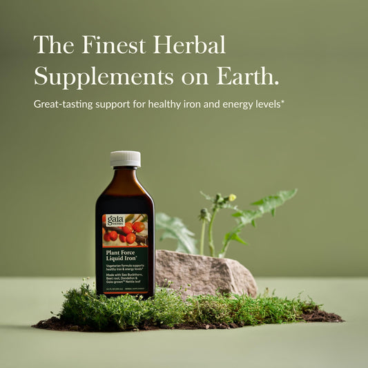 Gaia Herbs Plant Force Liquid Iron pouring into a spoon for easy dosing