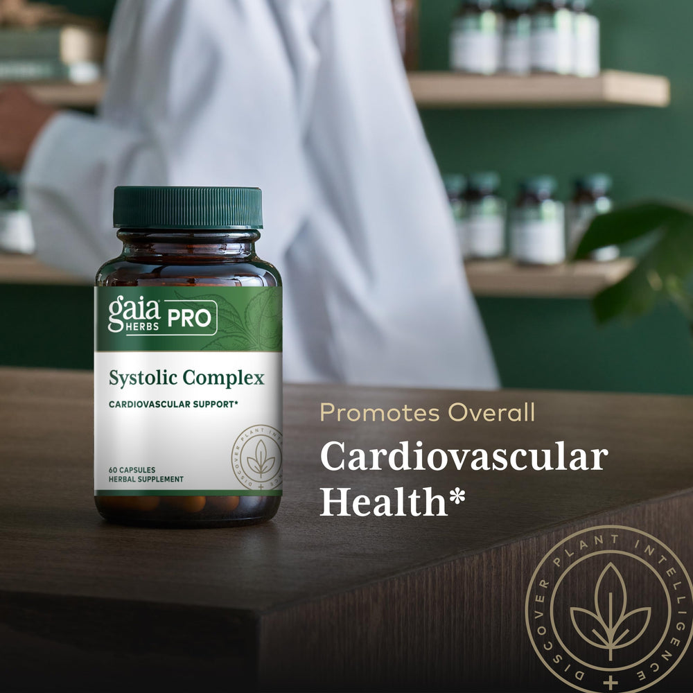 Olive leaf pictured with Gaia Herbs PRO Systolic Complex capsules