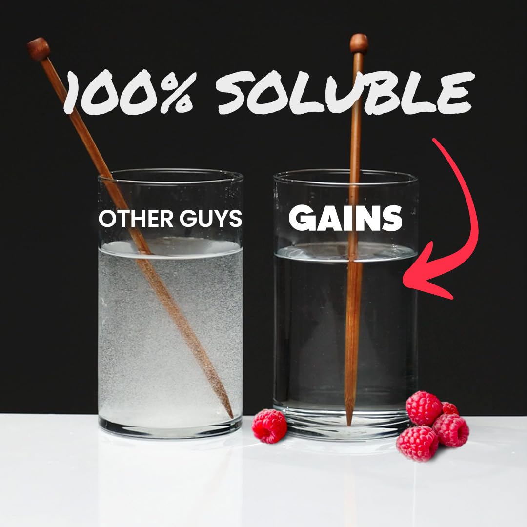 GAINS IN BULK creatine powder being stirred into water for dissolved texture