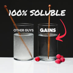 GAINS IN BULK creatine powder being stirred into water for dissolved texture