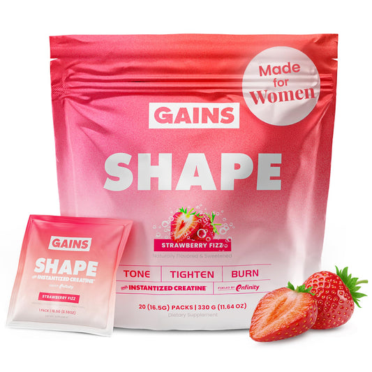 Gains in Bulk Shape Strawberry Fizz sachet held for on-the-go energy