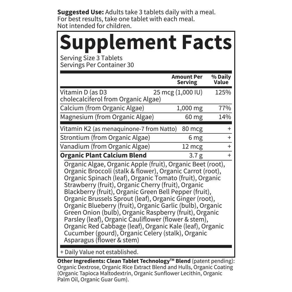 Garden of Life supplement beside water in a daily routine.