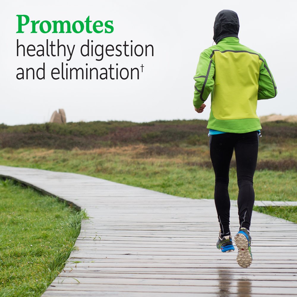 Pouring Fitbiotic into a beverage for easy daily digestion support