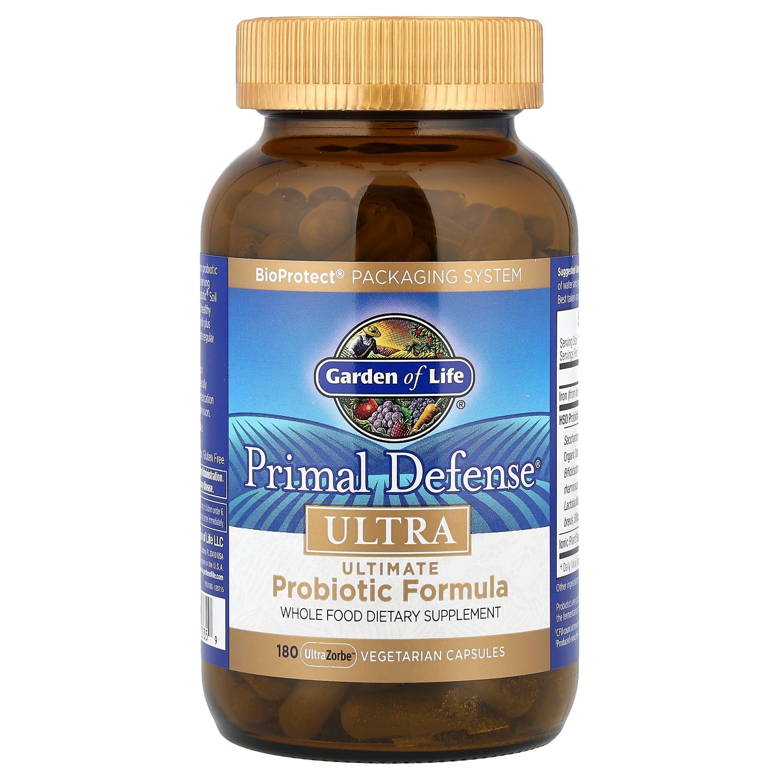 Garden of Life Primal Defense Ultra bottle with glass of water for daily use