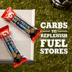 Gatorade Whey Protein Cookies and Creme bar on gym desk for quick fueling