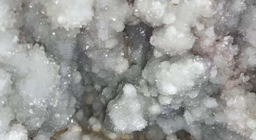 Generic Okenite Druzy Crystal Cluster close-up texture showing delicate fibers for energy work.