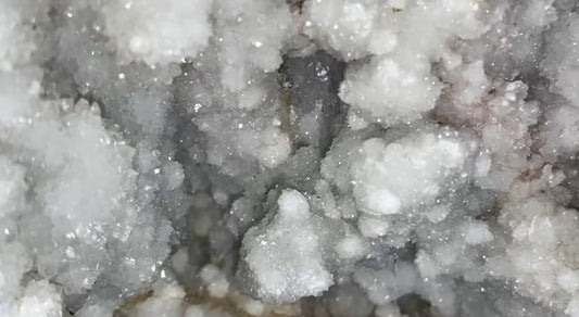 Generic Okenite Druzy Crystal Cluster close-up texture showing delicate fibers for energy work.