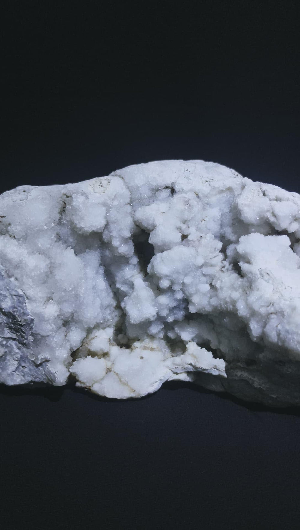 Generic Okenite Druzy Crystal Cluster on a meditation altar for focus.